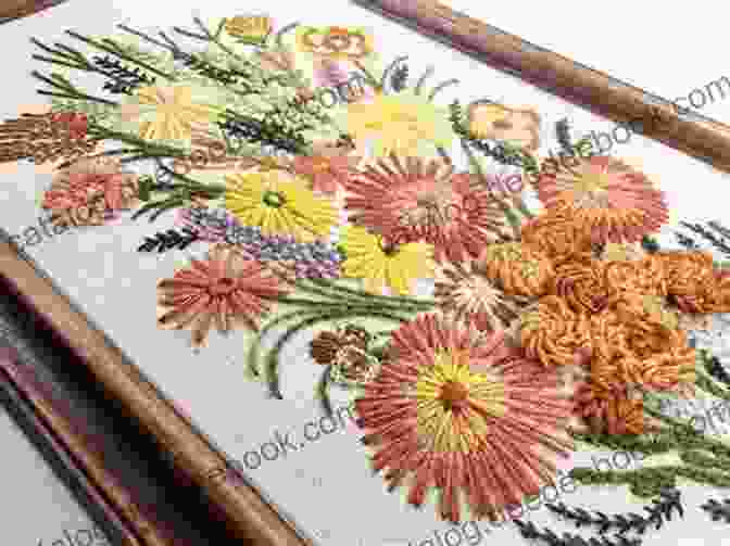 A Close Up Of An Embroidered Wall Art Piece Featuring A Colorful Floral Design. Ideas For Slow Stitchers: How To Create Your Own Custom Designs