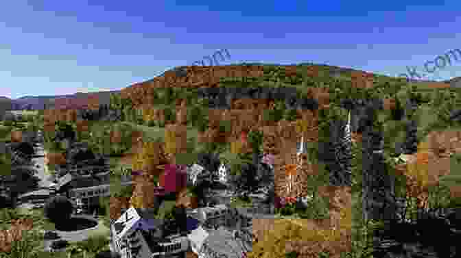 A Panoramic View Of The Quaint Village Of Grafton, Vermont, With Its White Clapboard Houses, Historic Buildings, And Lush Greenery. Whispers On The Desert Wind: Volume 1 Grafton