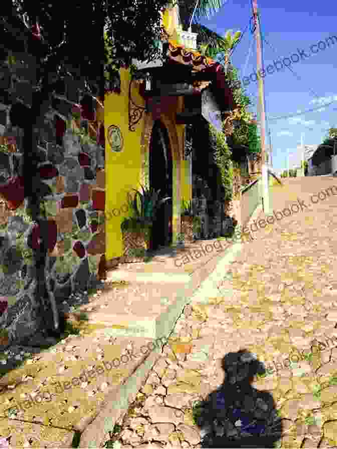 Stroll Through The Cobblestone Streets Of Ajijic, Lined With Colorful Houses And Vibrant Street Life A Stroll Through The Village Of Ajijic